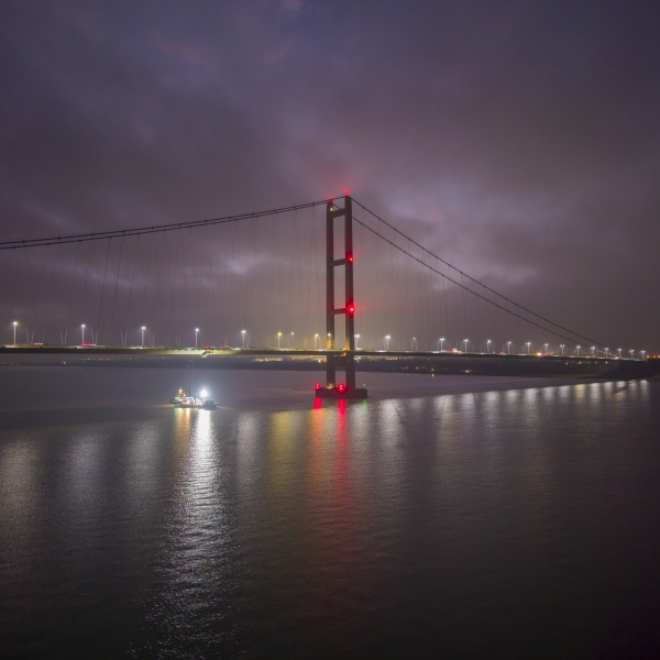 Night time drone shot over Humber Bridge