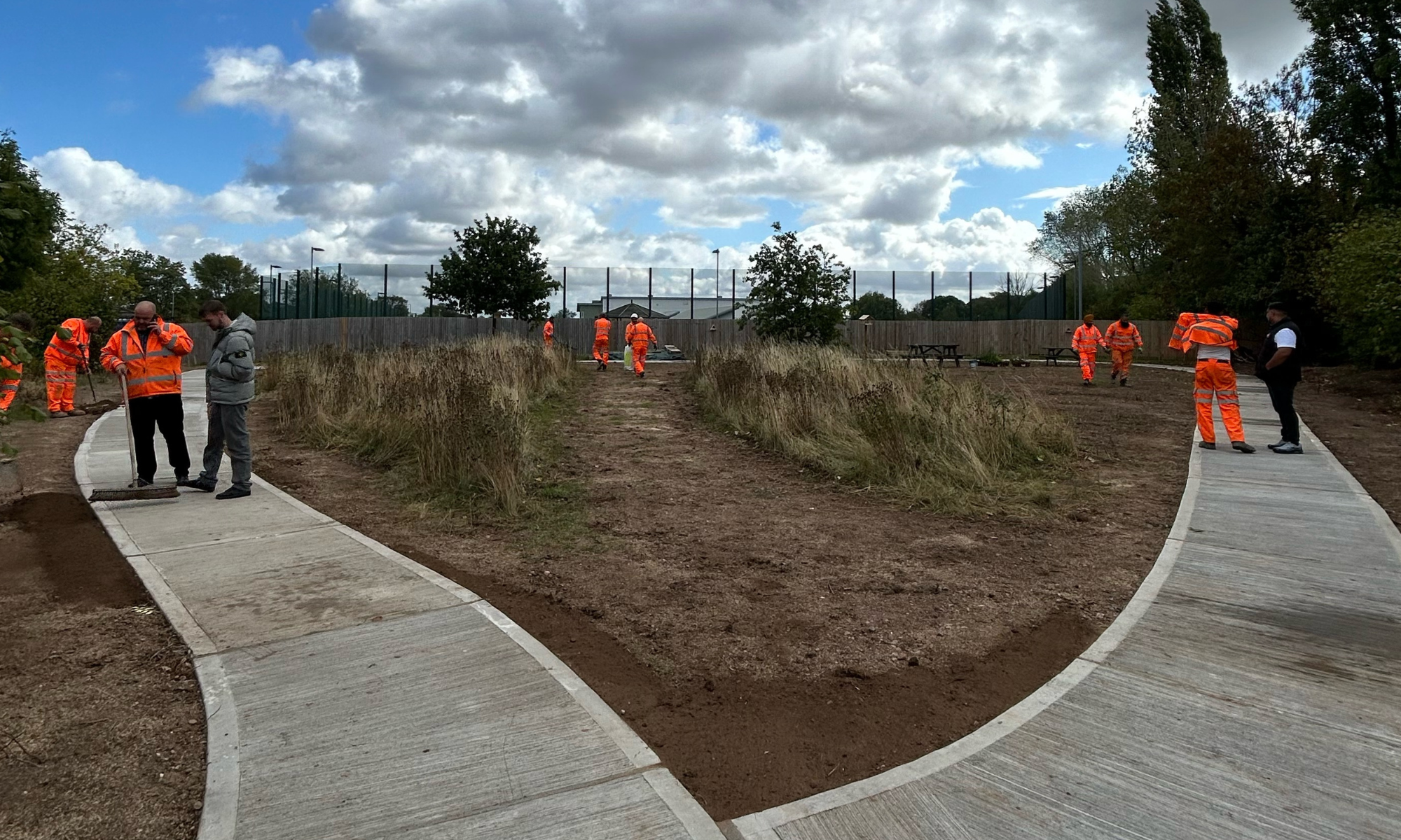Volunteers transforming an outdoor space